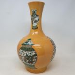 A Chinese famille verte vase, of baluster form, decorated vases, 37.5 cm high Report by RB Modern