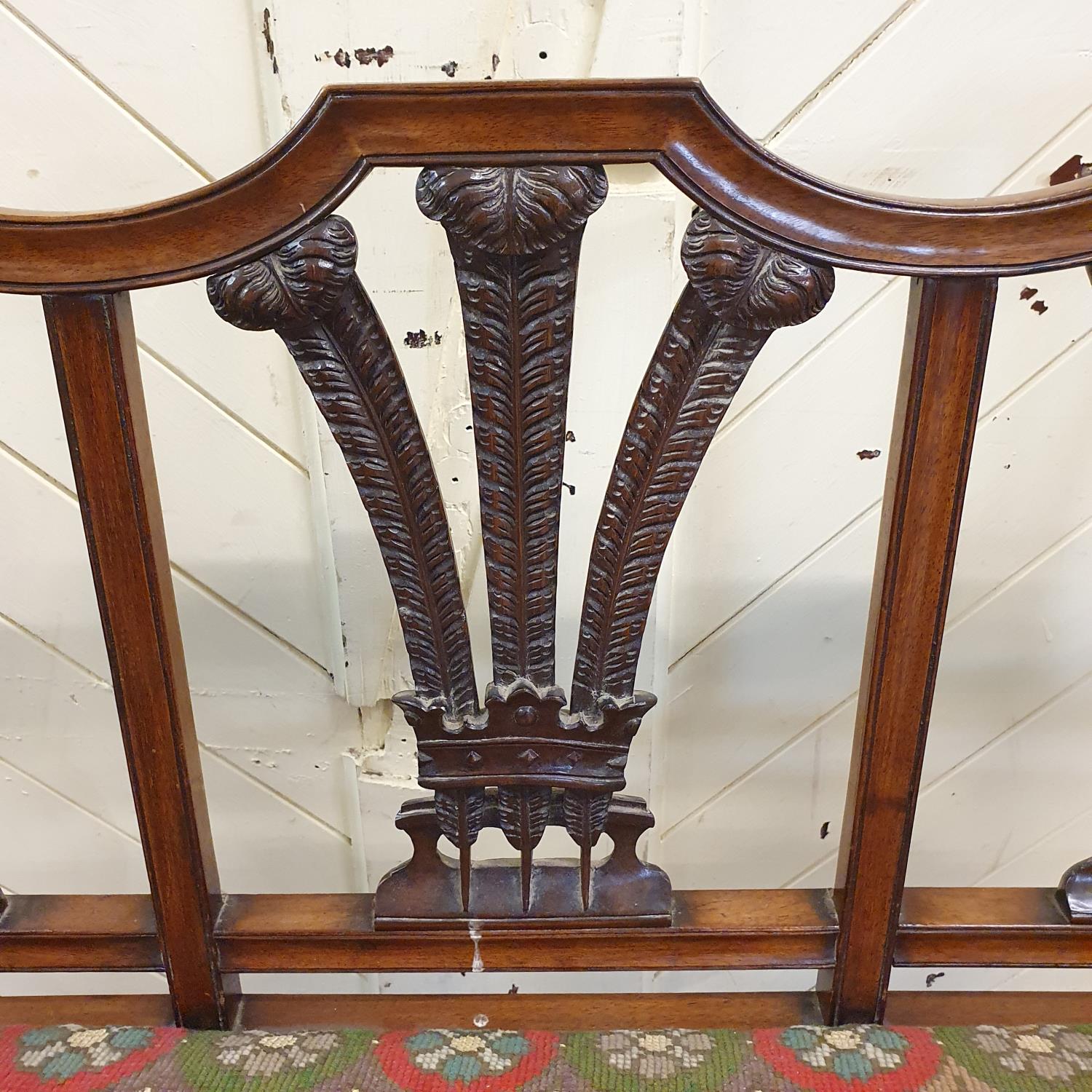 An unusual child's walnut chair back settee, with fleur de lys backs, a drop in seat and tapering - Image 2 of 3