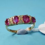 An 18ct ruby and diamond ring, approx. ring size O½ Stone secure in setting, light wear to mount, no