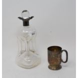 A silver christening mug, Birmingham 1903, approx. 3.5 ozt, cased, and a glass decanter and stopper,