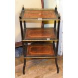 An ebonised three tier etagere, inlaid with amboyna and crossbanded, 45 cm wide Report by RB One