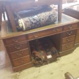 An early 20th century mahogany pedestal desk, 141 cm wide. 80cm h 136cm w 77cm d, overall