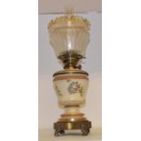 A Royal Worcester bush ivory oil lamp, with gilt metal mounts, date mark for 1876-91, 60 cm high