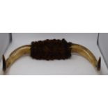 A pair of cow horns, 65 cm wide, a pair of riding boots, a fox mask, 1880, tack and other items (