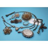 An oval silver locket, and other assorted items