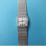 A lady's 18ct white gold Tissot wristwatch, with baton indices, on a mesh strap, approx. 37.7 g (all