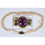 A four row seed/cultured pearl necklace, with an amethyst clasp Some discoloration 18.8 grams gross