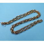 A yellow coloured metal link chain Report by RB Report by RB With a Ward & Sibley insurance