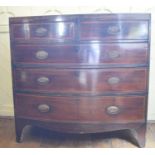 A 19th century inlaid mahogany bow front chest, of two short and three graduated long drawers, on