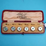 A set of six mother of pearl dress buttons, boxed