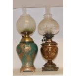 A late 19th/early 20th century Continental porcelain oil lamp, with gilt metal mounts, cut glass