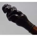 A 19th century walking stick, with carved handle, in the form of a monkey, 86 cm More images