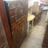 A 20th century hardwood cabinet, with two cupboard doors, 151 cm high x 96 cm wide