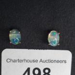 A pair of black Ethiopian opal and silver stud earrings