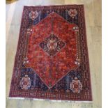 A Persian Qashqai rug, 190 cm x 126 cm