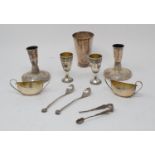 An Israeli silver coloured metal beaker, 9.5 cm high, a pair of silver salts, and other items