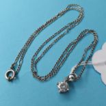 A white gold and diamond single stone pendant necklace, of 70 points