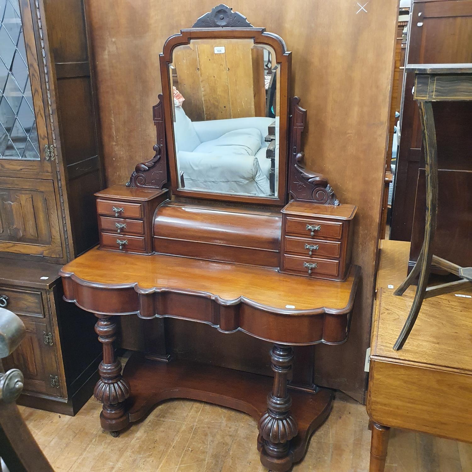 A 19th century Duchess mahogany dressing table, 120 cm wide