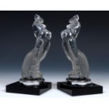 René Lalique (1860-1945), Serre Livres Coq Houdan, a pair of clear and frosted glass mascot bookends