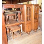 A 1920's oak display cabinet, an oak drawleaf table, a mahogany side table, a pair of coffee tables,