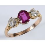 An 18ct gold, ruby and diamond three stone ring, approx. ring size Q½
