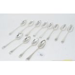 A set of twelve silver old English pattern dessertspoons, some initialled, various dates and makers,