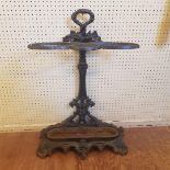 A cast iron stick stand, 50 cm wide