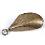 A Victorian silver gilt coloured metal novelty vinaigrette, in the form of a shell, opening to