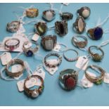 A group of twenty assorted silver dress rings