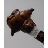A folk art carved walking stick, handle carved with two birds and a frog, 92 cm