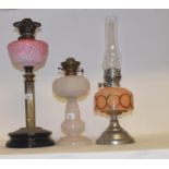 A late 19th/early 20th century brass oil lamp, with clear glass well and eight others (9) Oil lamp