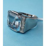 A white gold substantial aquamarine cocktail ring, of approx. 10ct, with diamonds set to the