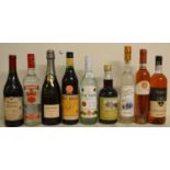 Nine mixed bottles of wine and spirits to include Smirnoff, Bacardi and Grappa Moscato