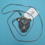 A silver, marcasite and ruby set panther necklace