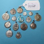 Fifteen silver St Christopher pendants