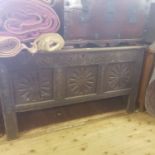 An 18th century oak coffer, 80 cm high, 146 cm wide