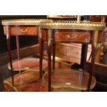 A pair of Louis XVI style French marble top mahogany two tier tables, with gilt metal mounts, 73 x