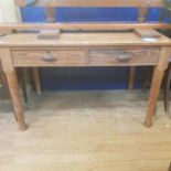 A pine side table, with two drawers, 123 cm wide, and a mahogany pot cupboard (2)