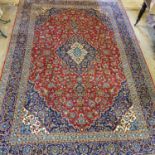 A Persian Kashan carpet, 437 x 295 cnm