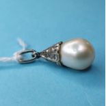 A cultured pearl and diamond set pendant 12mm to mount, untested low to medium lustre 3.5 grams