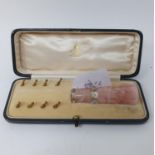 A 19th century rose quartz umbrella handle, in fitted case, with retail label for J C Vickery,