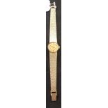 A lady's 9ct gold Longines wristwatch, with baton indices, approx. 33.6 g (all in)
