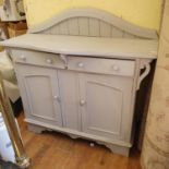 A painted side cabinet and a painted dresser base