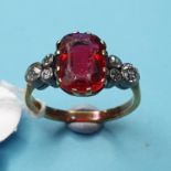 An 18ct gold cocktail ring, approx. ring size O Not Diamonds red stone paste