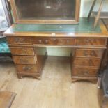 A mahogany pedestal desk