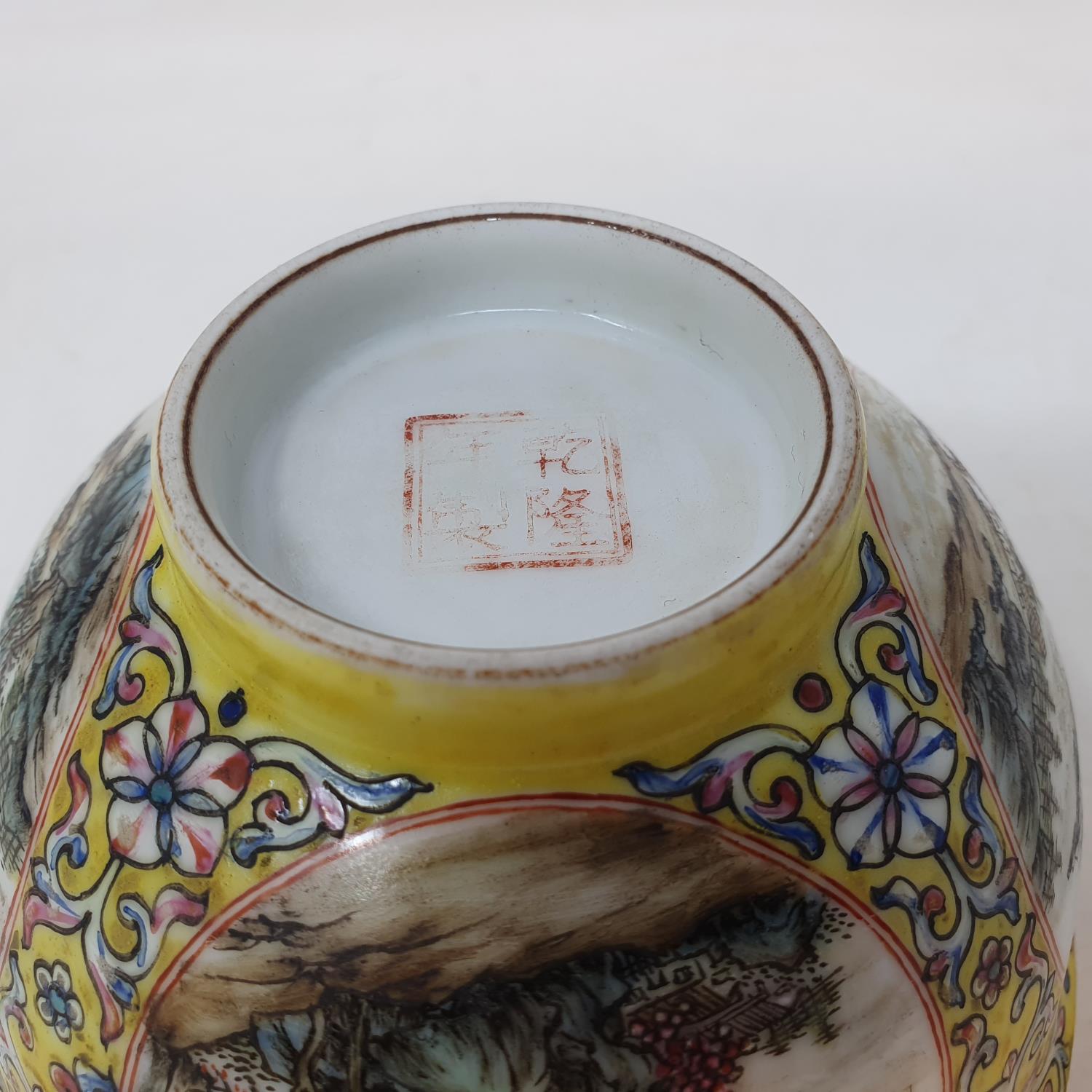 A Chinese porcelain medallion bowl, decorated vignettes of mountain scenes on a yelllow ground - Image 6 of 6