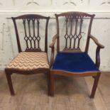 A set of eight late 18th century style mahogany dining chairs, with carved and pierced splats,