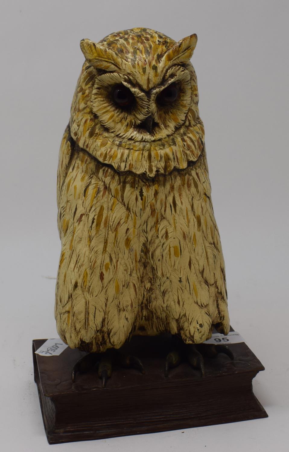 A painted bronze owl, perched on a hinged book, 26 cm high Report by RB Modern Overla condition good