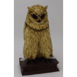 A painted bronze owl, perched on a hinged book, 26 cm high Report by RB Modern Overla condition good