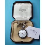 A lady's silver coloured metal fob watch, with Arabic numerals, the case set seed pearls, with a